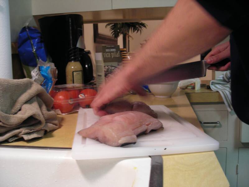 cutting up wahoo filets